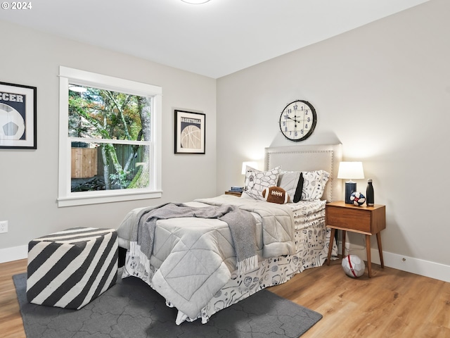 bedroom featuring hardwood / wood-style flooring