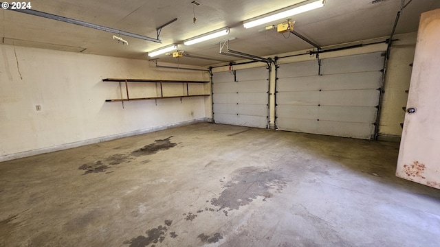 1176 SE 4th Ave, Mill City, OR 97360 - garage featuring a garage door opener