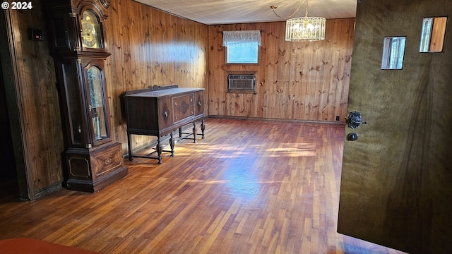 interior space featuring wood walls and dark wood-type flooring