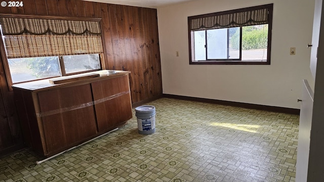1176 SE 4th Ave, Mill City, OR 97360 - spare room featuring wood walls and baseboards