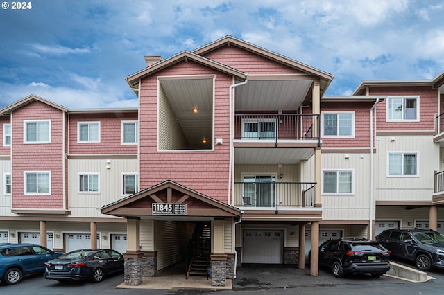 view of building exterior featuring a garage