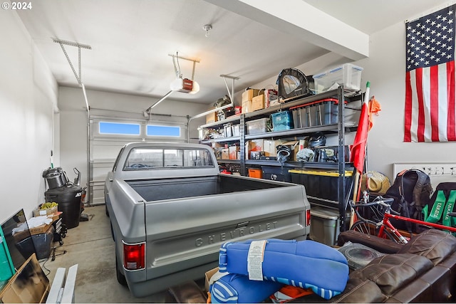 garage featuring a garage door opener