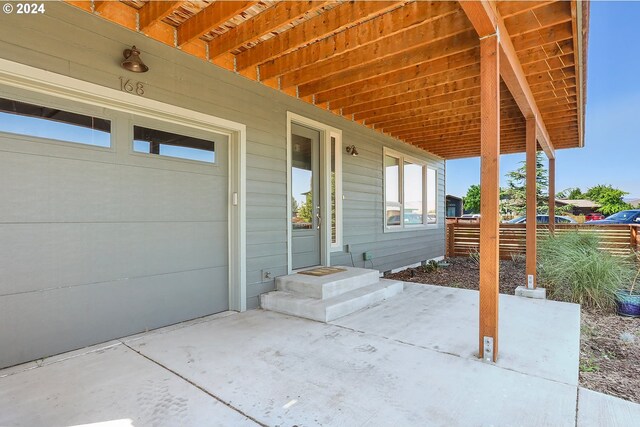 view of patio featuring a garage