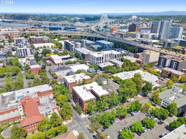 bird's eye view featuring a view of city and a water view