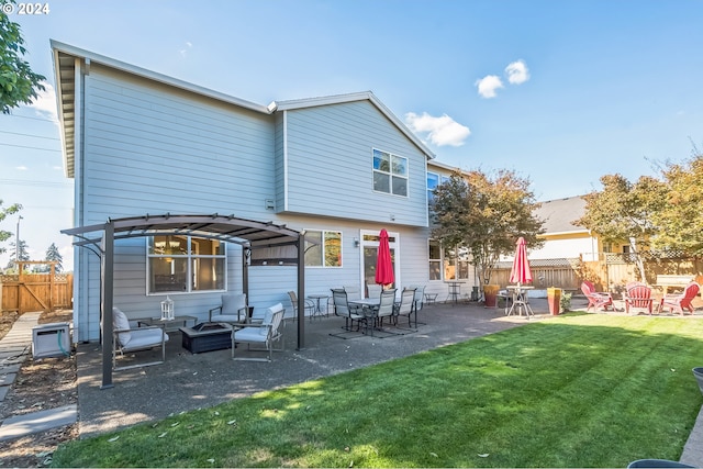 rear view of house featuring an outdoor hangout area, a lawn, and a patio