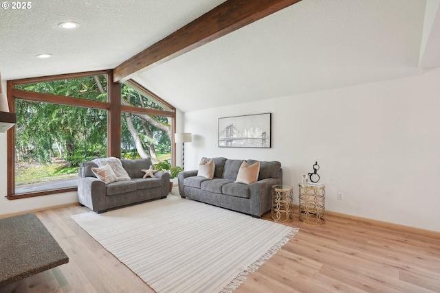 4243 Spring Rock Cir, West Linn, OR 97068 - living room with wood finished floors, a textured ceiling, and recessed lighting