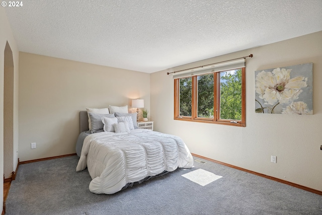 4243 Spring Rock Cir, West Linn, OR 97068 - bedroom with a textured ceiling and carpet