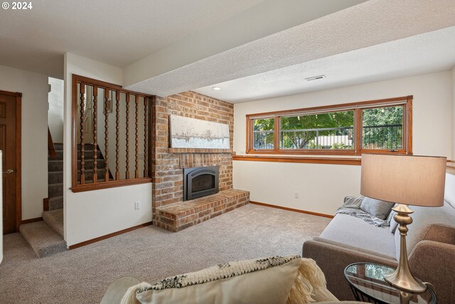4243 Spring Rock Cir, West Linn, OR 97068 - living area with carpet floors, a fireplace, a textured ceiling, and stairs