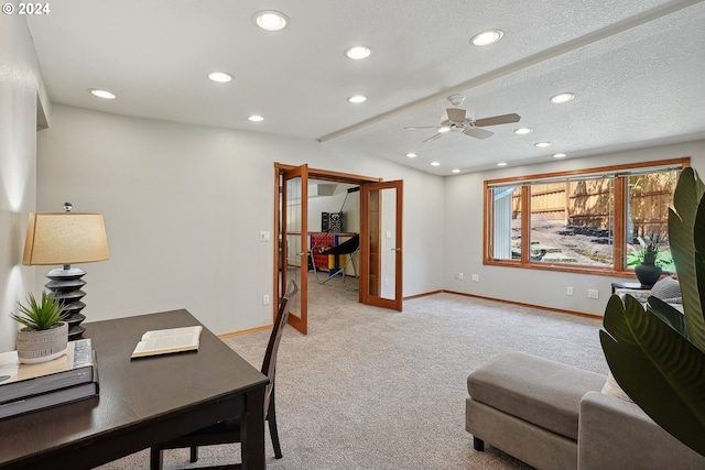 office area featuring ceiling fan, light colored carpet, a textured ceiling, and french doors