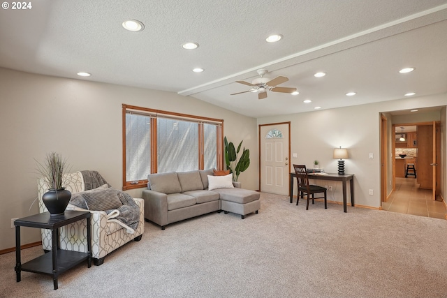 living room with light carpet, ceiling fan, lofted ceiling with beams, and a textured ceiling