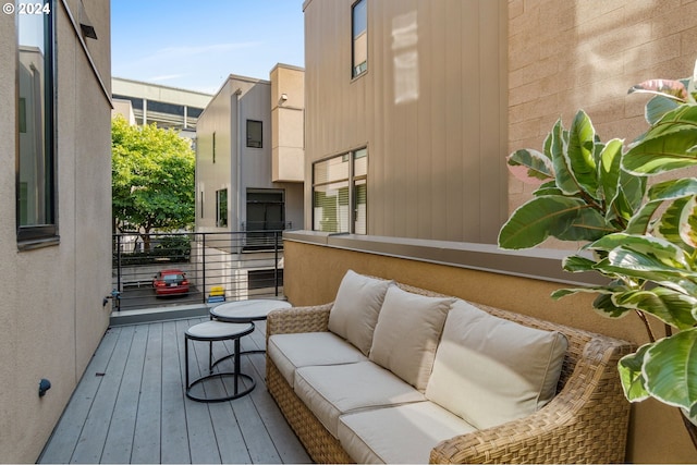 wooden deck featuring outdoor lounge area