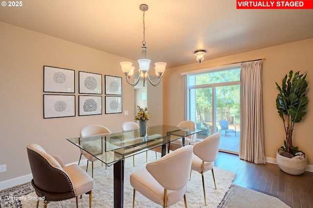15003 NE 102nd St, Vancouver, WA 98682 - dining room featuring a chandelier, baseboards, and hardwood / wood-style flooring