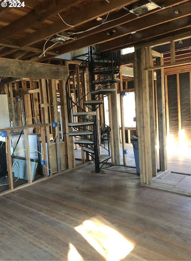 basement featuring wood-type flooring