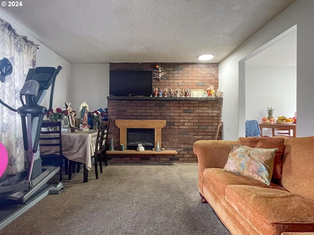 living room with carpet, a textured ceiling, and a brick fireplace