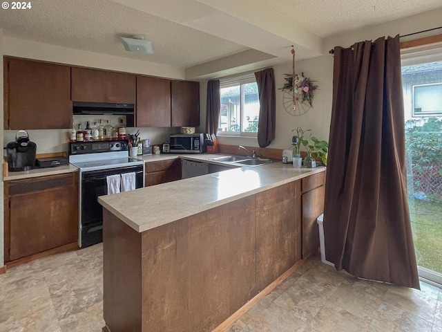 kitchen with dishwasher, sink, white electric range, kitchen peninsula, and a textured ceiling