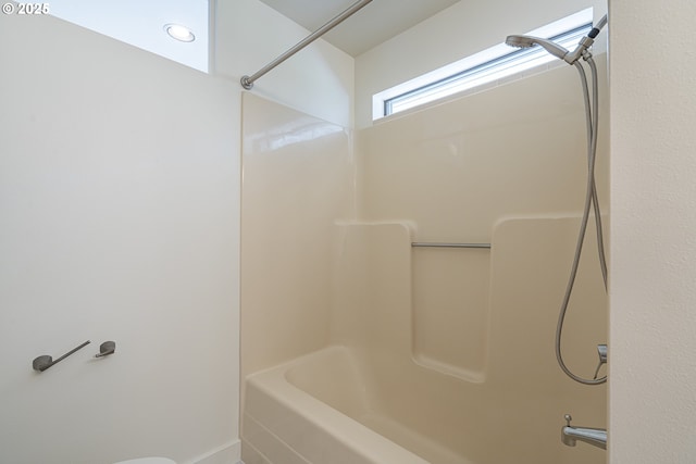 bathroom with shower / bathtub combination