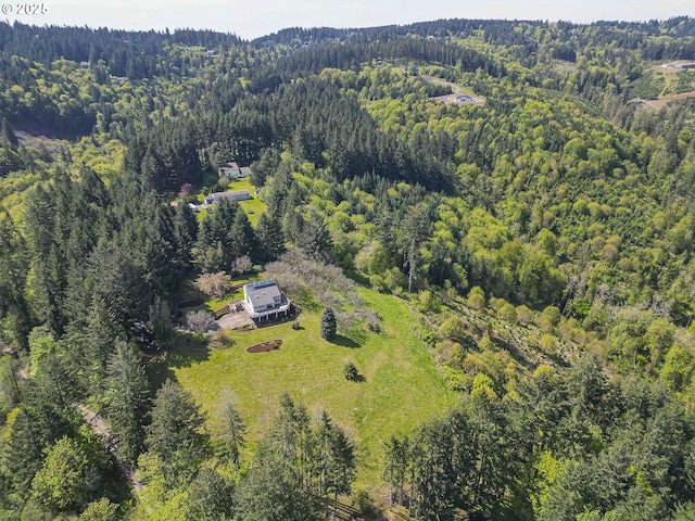 aerial view featuring a forest view
