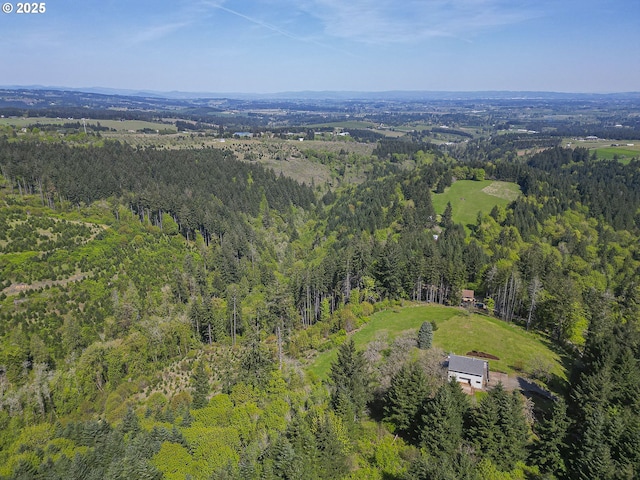 aerial view featuring a forest view