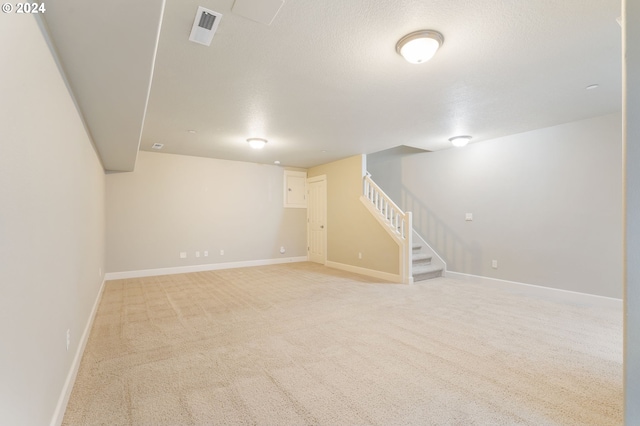 basement with carpet flooring