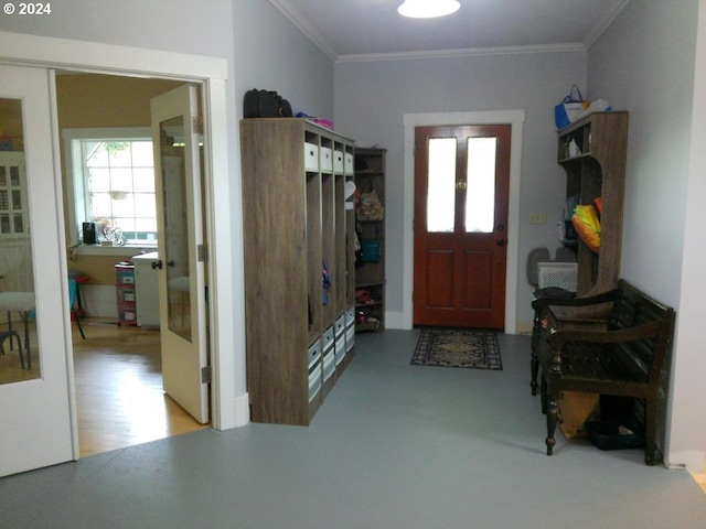 mudroom featuring french doors and ornamental molding