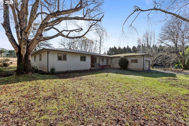 ranch-style home with a front yard