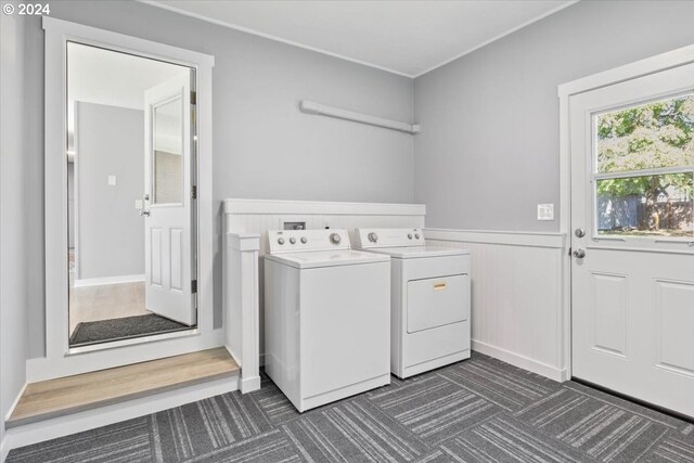 laundry area with washing machine and dryer