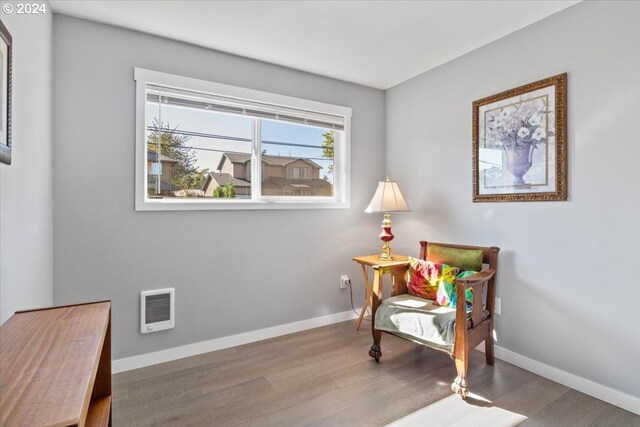 sitting room featuring hardwood / wood-style flooring