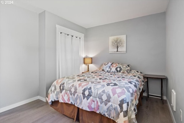 bedroom featuring dark hardwood / wood-style floors