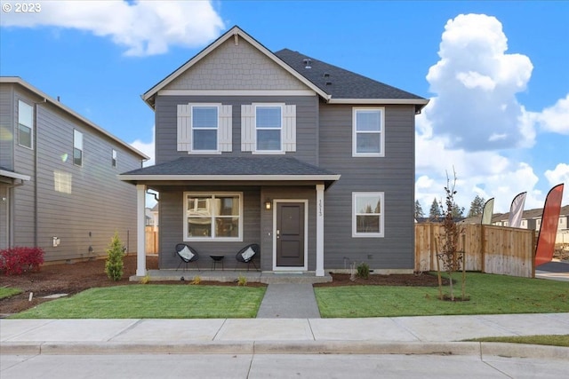 view of front of home with a front lawn