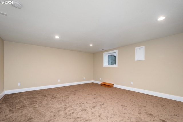 unfurnished room featuring carpet