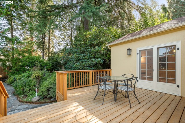 wooden terrace featuring french doors