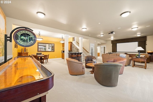 playroom with baseboards and light colored carpet