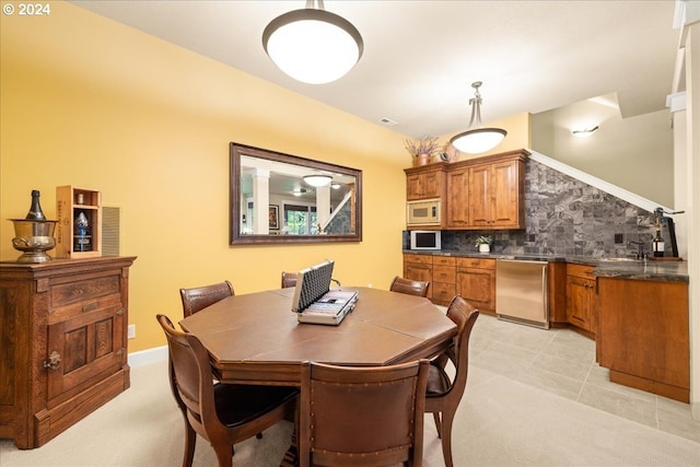 dining room with light tile patterned flooring