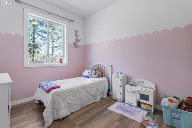 bedroom featuring dark wood-type flooring