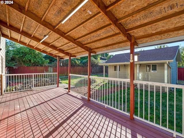 deck featuring a lawn