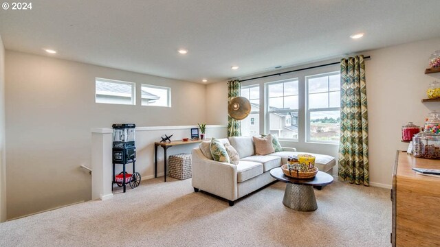 living room featuring light carpet