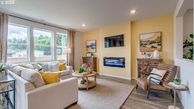 sitting room featuring wood-type flooring