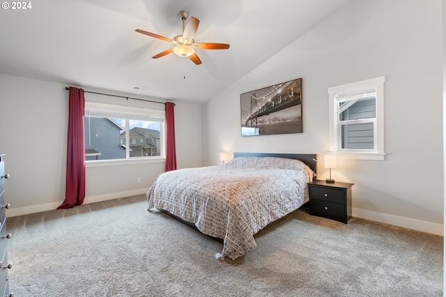 carpeted bedroom featuring ceiling fan and lofted ceiling