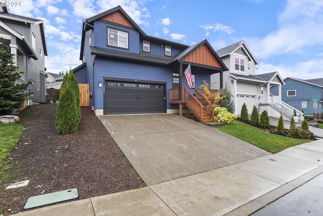 view of front of home featuring covered porch and a garage