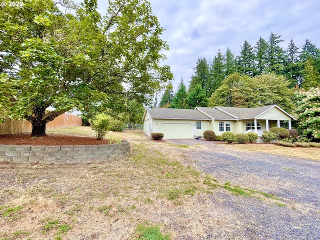 single story home featuring a garage