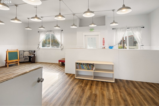 155 E Main St, Lowell, OR 97452 - rec room featuring wood finished floors, healthy amount of natural light, and baseboards