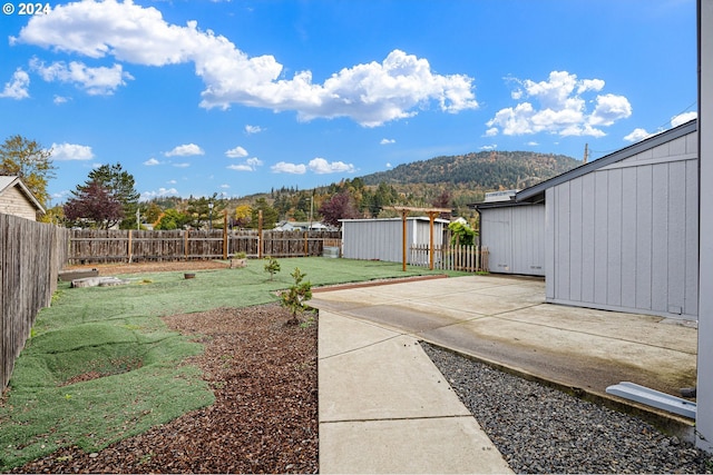 155 E Main St, Lowell, OR 97452 - view of yard with a patio area and a mountain view
