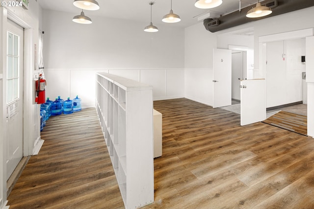 155 E Main St, Lowell, OR 97452 - corridor featuring wood finished floors and a wainscoted wall