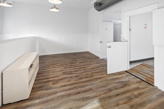 155 E Main St, Lowell, OR 97452 - spare room featuring wood finished floors and a wainscoted wall