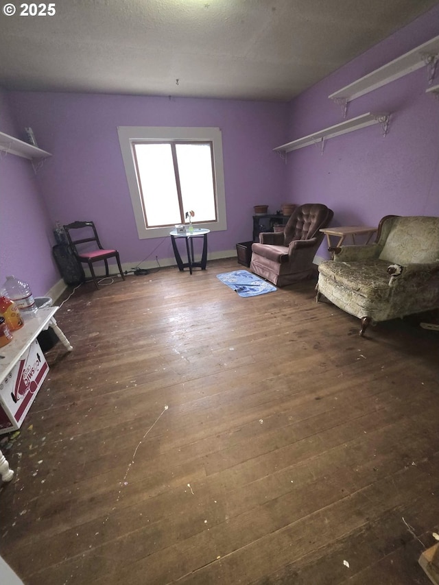 living area with wood-type flooring