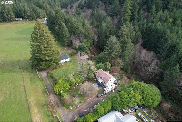 aerial view with a wooded view