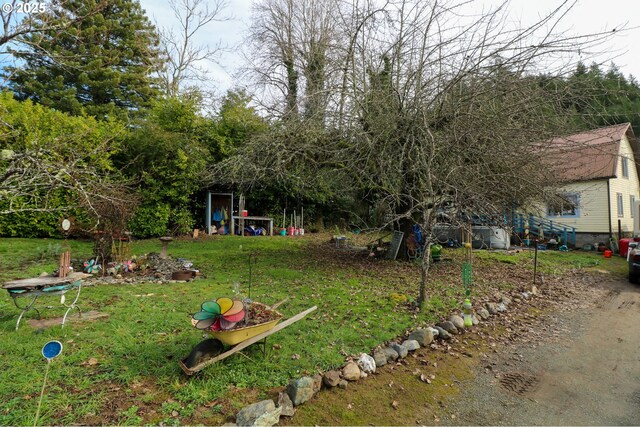 back of house with a swimming pool side deck