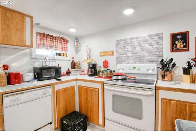 kitchen featuring white appliances