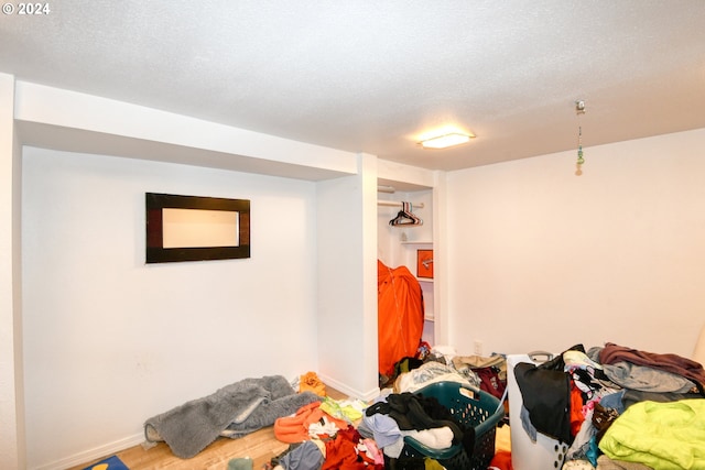 bedroom featuring a textured ceiling