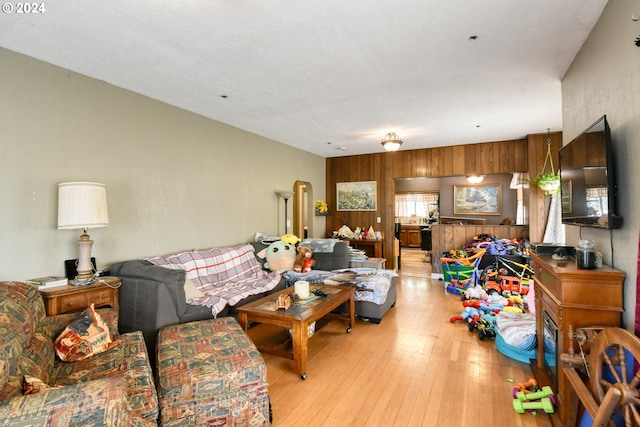 living room with light hardwood / wood-style flooring